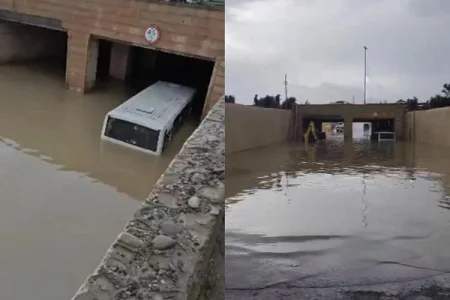 Bakıda sərnişin avtobusu suyun içində qaldı - Sərnişinlər kəndirlə xilas edildi - VİDEO